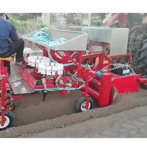 四行旋耕起垄镇压移栽浇水一体机