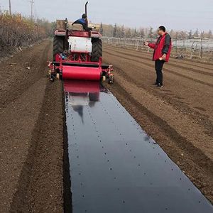 140型旋耕起垄镇压施肥覆膜打药打孔一体机