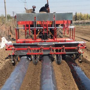 240型三垄旋耕起垄施肥铺膜铺管一体机